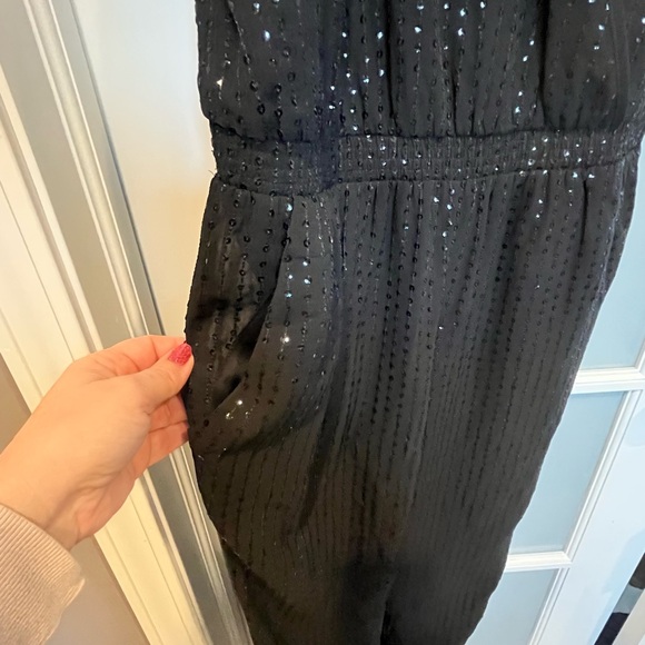 Elegant Black Sleeveless Jumpsuit - Picture 4 of 5